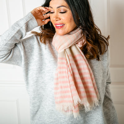 The Sandy scarf in Pink and cream made from a cotton and viscose blend